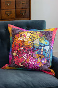art theory pillow with neon peach quilting