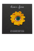 between eye flower patch in gold