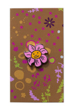 enamel smiling flower pin from the between collection