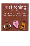 i heart stitching zipper pulls in brown/amber