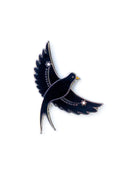 black flying bird enamel pin