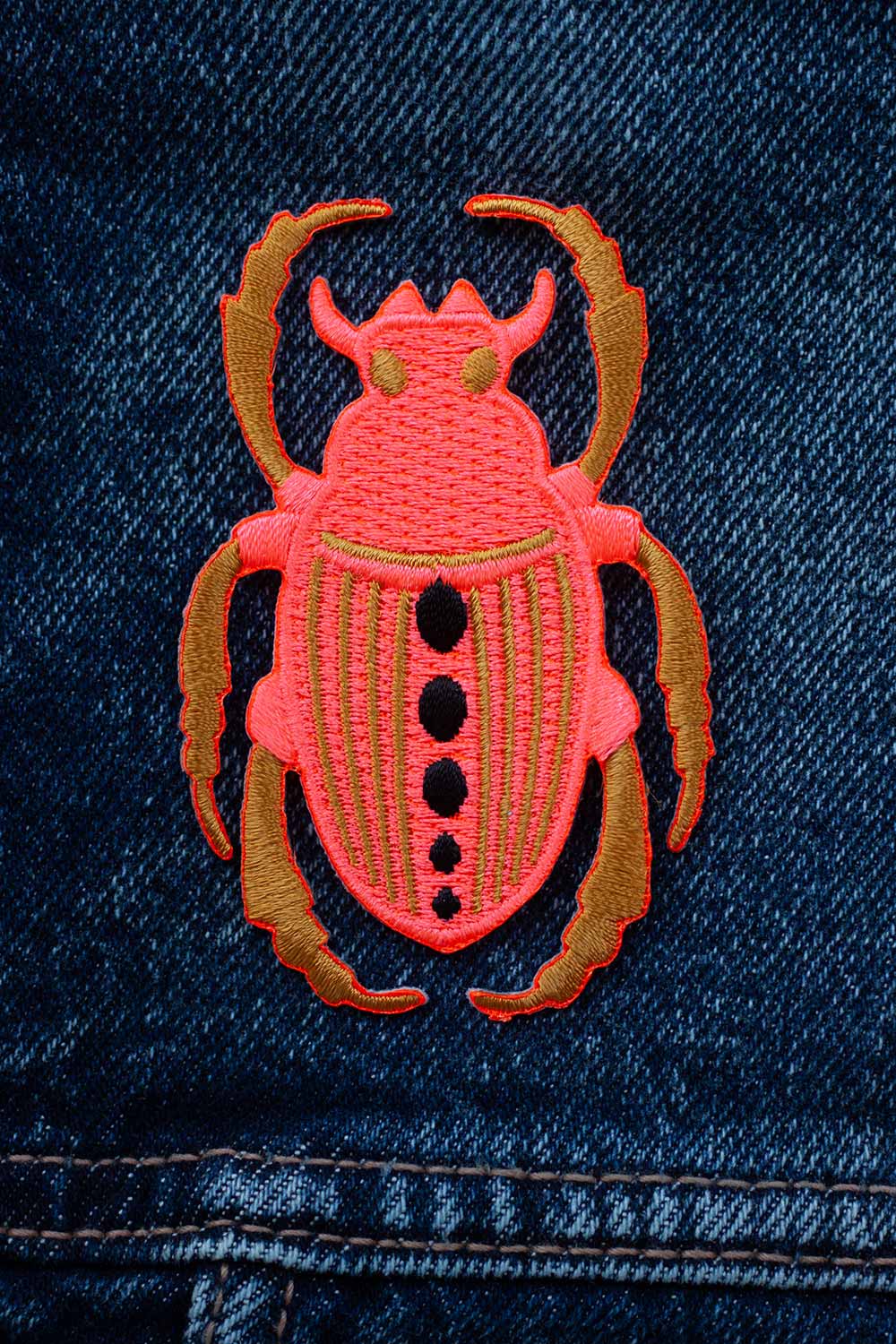 pink neon scarab patch