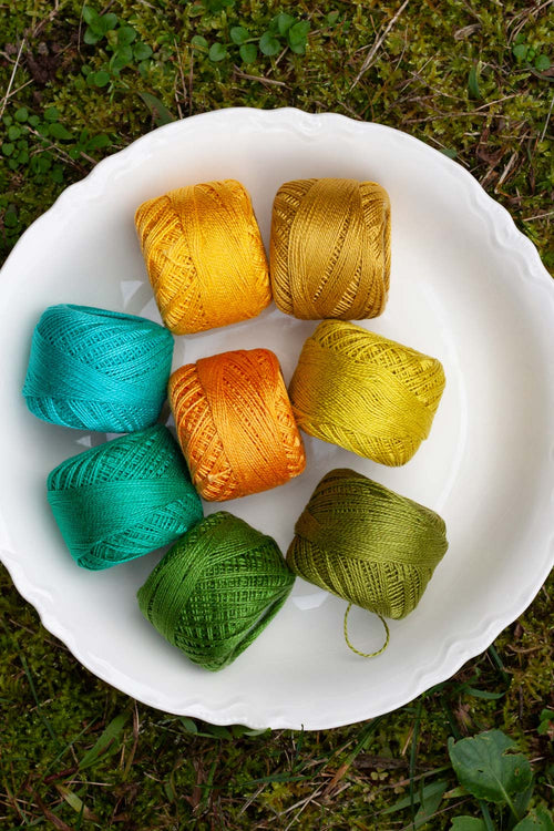 cozy perle set in yellow green
