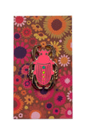 neon pink enamel scarab pin