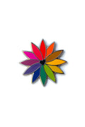 rainbow flower black center enamel pin