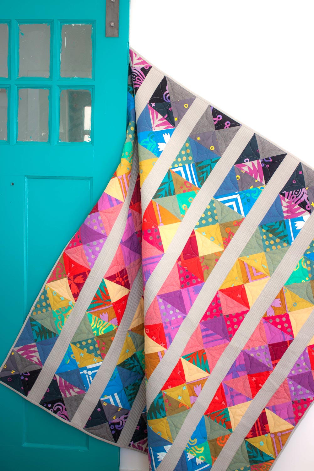 spectrum quilt in handcrafted patchwork